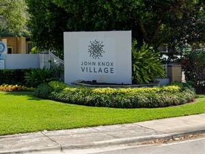 Carousel image 0608ae6bf3e89ed28a15 john knox village exterior sign