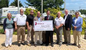 Carousel image 9920ed04b8f33b3df3e6 kean check presentation raritan township group pic