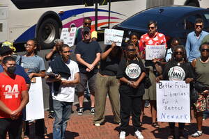 Carousel image 463bec ibrary protest