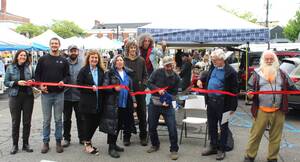 Carousel image 5c16bd312d3201e7d556 market ribbon cutting photo