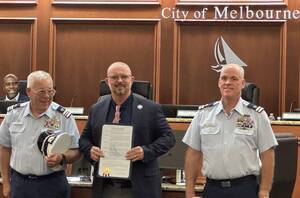 Carousel image 9e11ef elbourne lorida ayor aul lfrey presents proclamation to members of the nited tates oast uard uxiliary