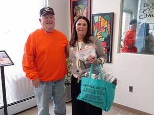 Carousel image b1a0614931d3f6e7d056 maria with donations  2 