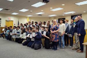 Carousel image cb3e7f762de87a6060b9 marching gaels at council meeting