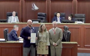Carousel image e417b8 ayor aul lfrey presents proclamation to pace oast ealth oundation