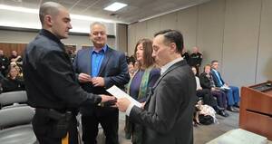 Carousel image f109bb6534ccd20a23ad mayor brad cohen administering the oath of office for patrolman connor clare