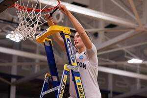Carousel image e64c2935b6ff1352f5f4 meghan cuts down net
