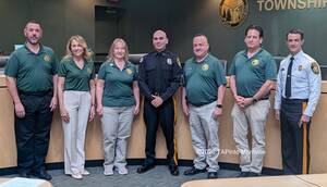 Carousel image 2d07756fdc2c32270d2a patrolman constantino esposito  with the township committee and the police chief sab