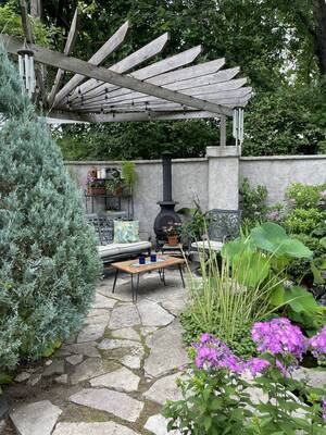 Carousel image 71638649b9367e1021ee patio at edge of pond photo credit melindamyers300