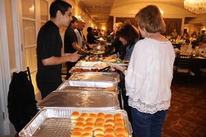 Carousel image 16b8056a48fdb4d2de03 people on serving line