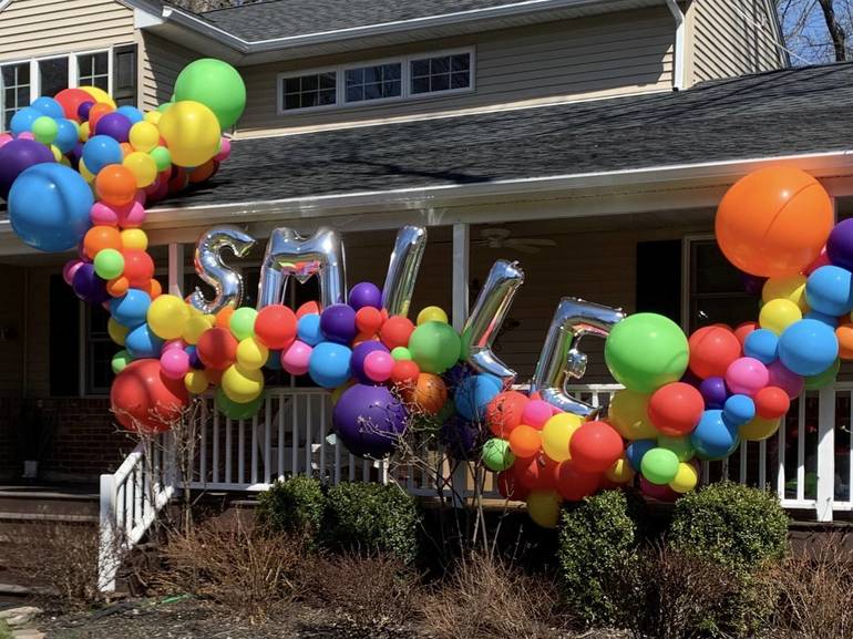 Local Balloon Designer Spreads Smiles with Balloon Art in Global