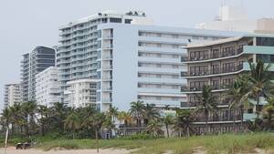 Carousel image 7886846a006c0555d1a6 pompano beach front condo buildings cluster on shore dunes seagrass in foreground