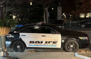 Carousel image d74a0e4fca24879569fb police car at night