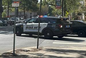 Carousel image e12b1fd0fea5be8b03e0 police car turning onto nassau
