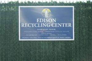 Carousel image 419a9093211874c190ce recycling center sign