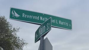 Carousel image 5b4bae7472a98a5890d0 reverend nathaniel harris street sign