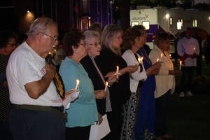 Carousel image c0dc64a953db52c9b1f9 residents with candles
