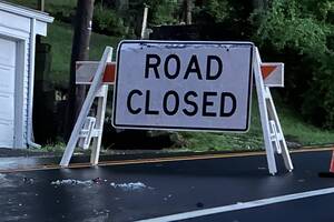 Carousel image 84418566c5fd705c5c94 road closed