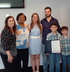 Carousel image 624e49dc18d544389bc7 ryan lopes  mrs. patrico  ms. drayton and his family