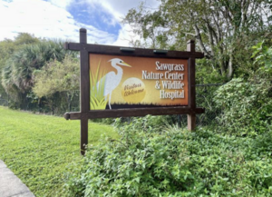 Carousel image 5da54cb6bf44f0e9f48e sawgrass nature center sign