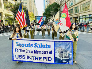 Carousel image 3533eaa8153ce75a9df2 scouting america troop 19 marking up 5th avenue with the former members of the uss intrepid 