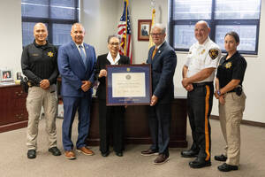 Carousel image 599a884b0e121df613ed sheriff receiving accreditation