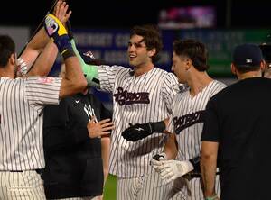 Carousel image cc4bcac4a18bd04260f5 sompixpats2025spencerjoneswalkoffdugoutcelebration