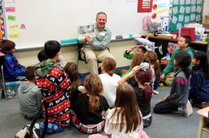 Carousel image 5f4174aff3878a195308 tapintospf editor john mooney reads to 3rd graders at coles school. dsc03527 1 