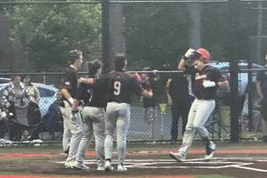 Carousel image 50b222ce4666f987f744 team celebrates homerun with fischer