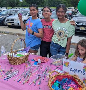 Carousel image ea28c9d49da1ac869a6d teen advisory board members help out at the event