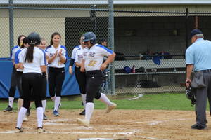 Carousel image 64b4e154c07b10087813 the tigers celebrate after a home run from sophia aqeel 