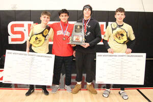 Carousel image b0b2bb58310d77d8484a the somers captains celebrate with the hardware.
