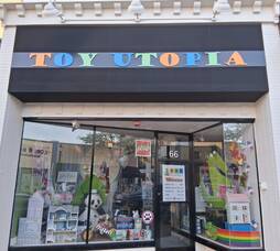 Carousel image ad60f2f851a6ddc8fa4f toy utopia store front