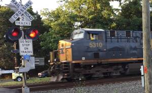 Carousel image 65bb5ab77313081ae4ea train crossing locomotive file photo