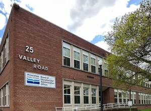 Carousel image 5b6e141f8743ffff377f valley road building with sign  2 