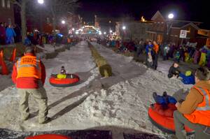 Carousel image 9cb4091460e38e7c06e6 winter fest night sledding on center street 2 1 