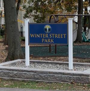 Carousel image efad4a24b05be8f7d7a3 winter street park sign