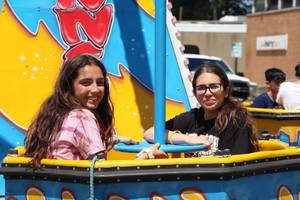 Carousel image 4003f13766e8e7bab105 wood ridge town day girls on a ride