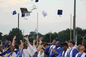 Carousel image 6a076672a786119e685a wood ridge hs grads toss caps