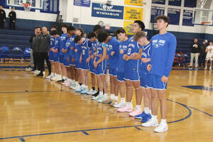 Carousel image dda06b7076ccc834f8d0 wood ridge boys basketball team during anthem
