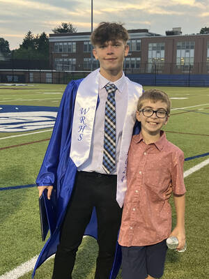 Carousel image e603f9d13612bb40bf70 wood ridge brian harasek at graduation