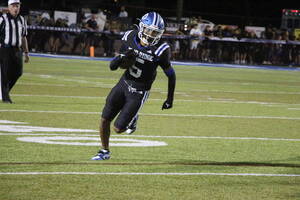 Carousel image f1ca0fac01e3d7e23759 wood ridge jaydin punt runs the ball up field
