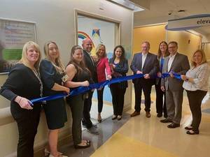 Carousel image b57b52e85d20162e2690 best crop 97eb2eb4cd9e6d53d161 best crop f93c849c03b83fd97869 roccos room ribbon cutting